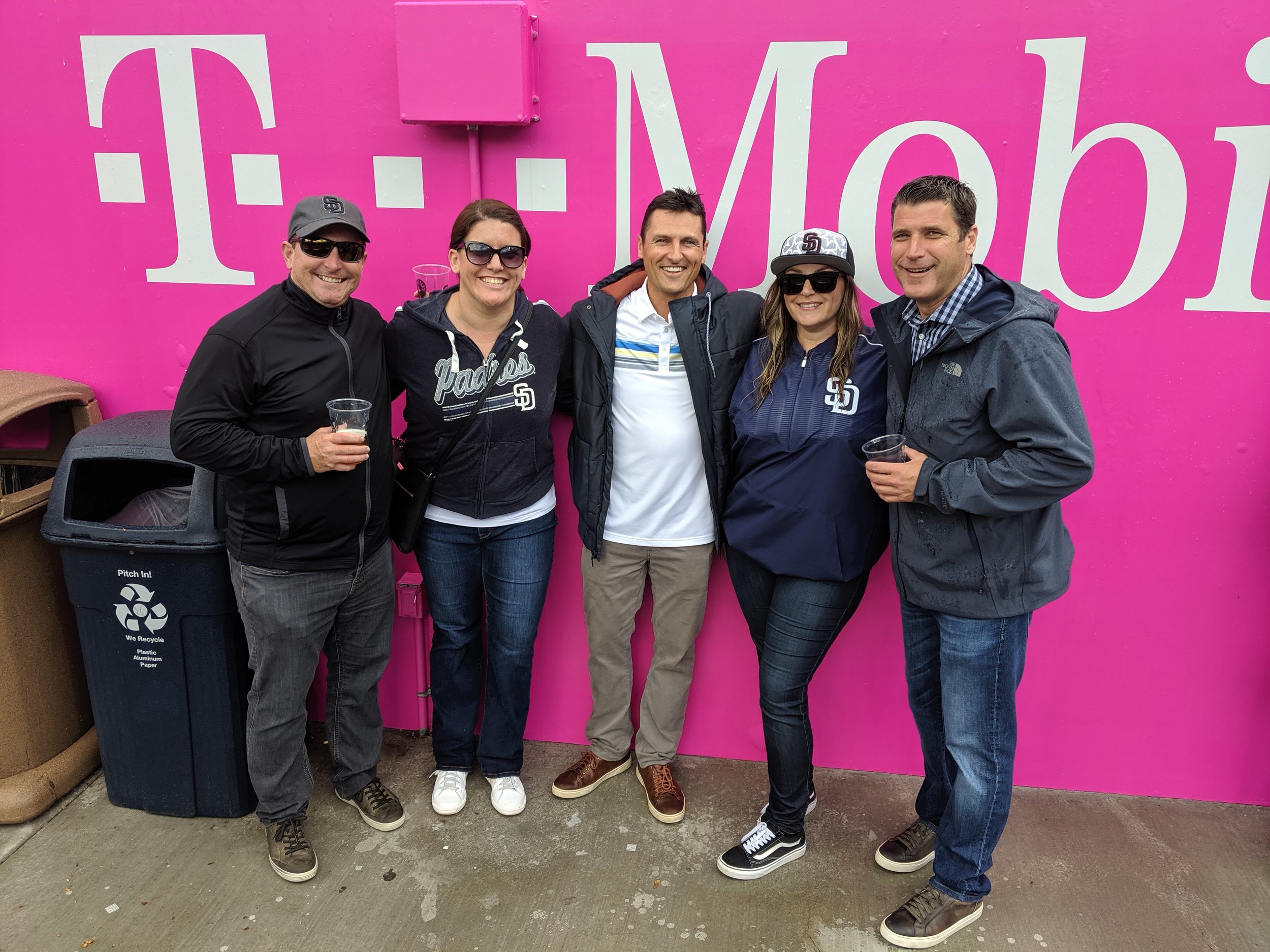 Jeremy Hoolihan, Christina Haake, Sam Brown, Yvonne Gallagher and Sam Clayto smiling with arms around each other's shoulders