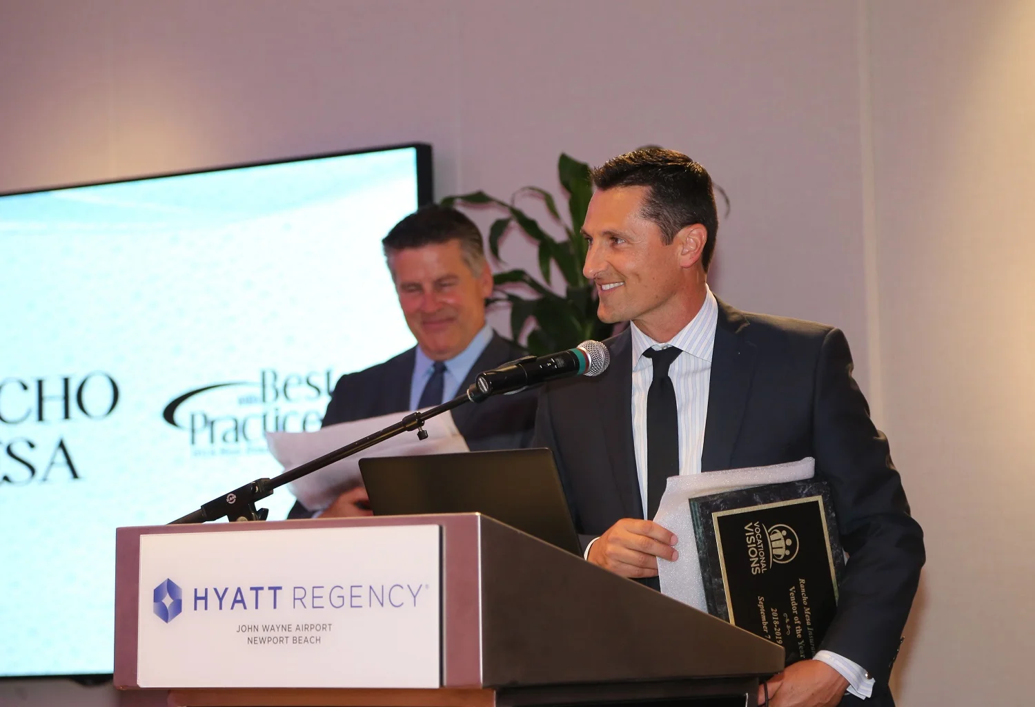 Sam Brown , Vice President of the Human Services Group at Rancho Mesa, accepting the Vendor of the Year award.