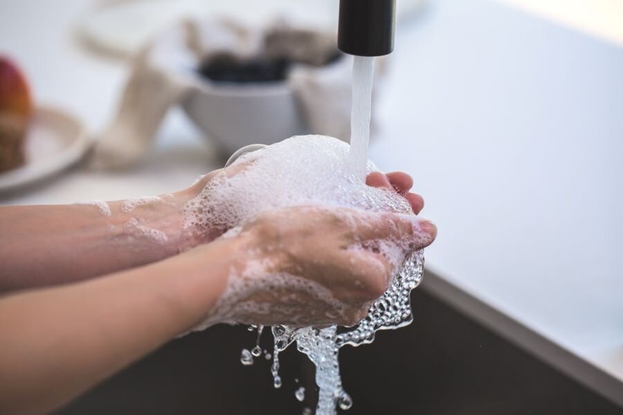 Person Washing Hands.jpg