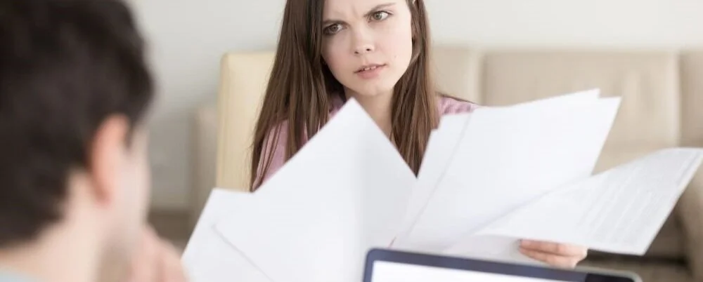 Woman+Man+Papers+Bills+Discuss++%282%29.jpg