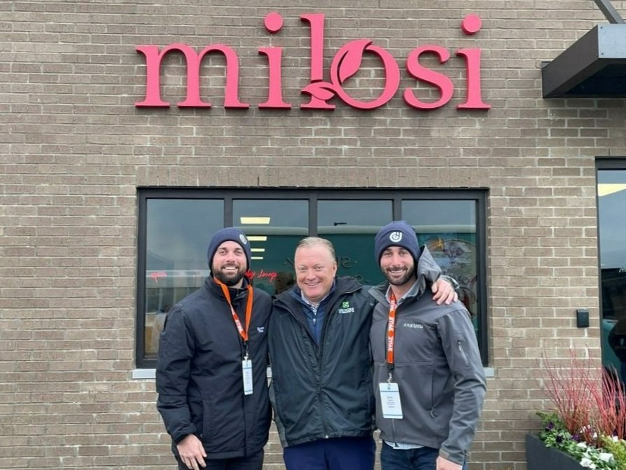  Pictured from left,  Greg Garcia, Marty Grunder, and Drew Gracia in front of Milosi Landscape. 