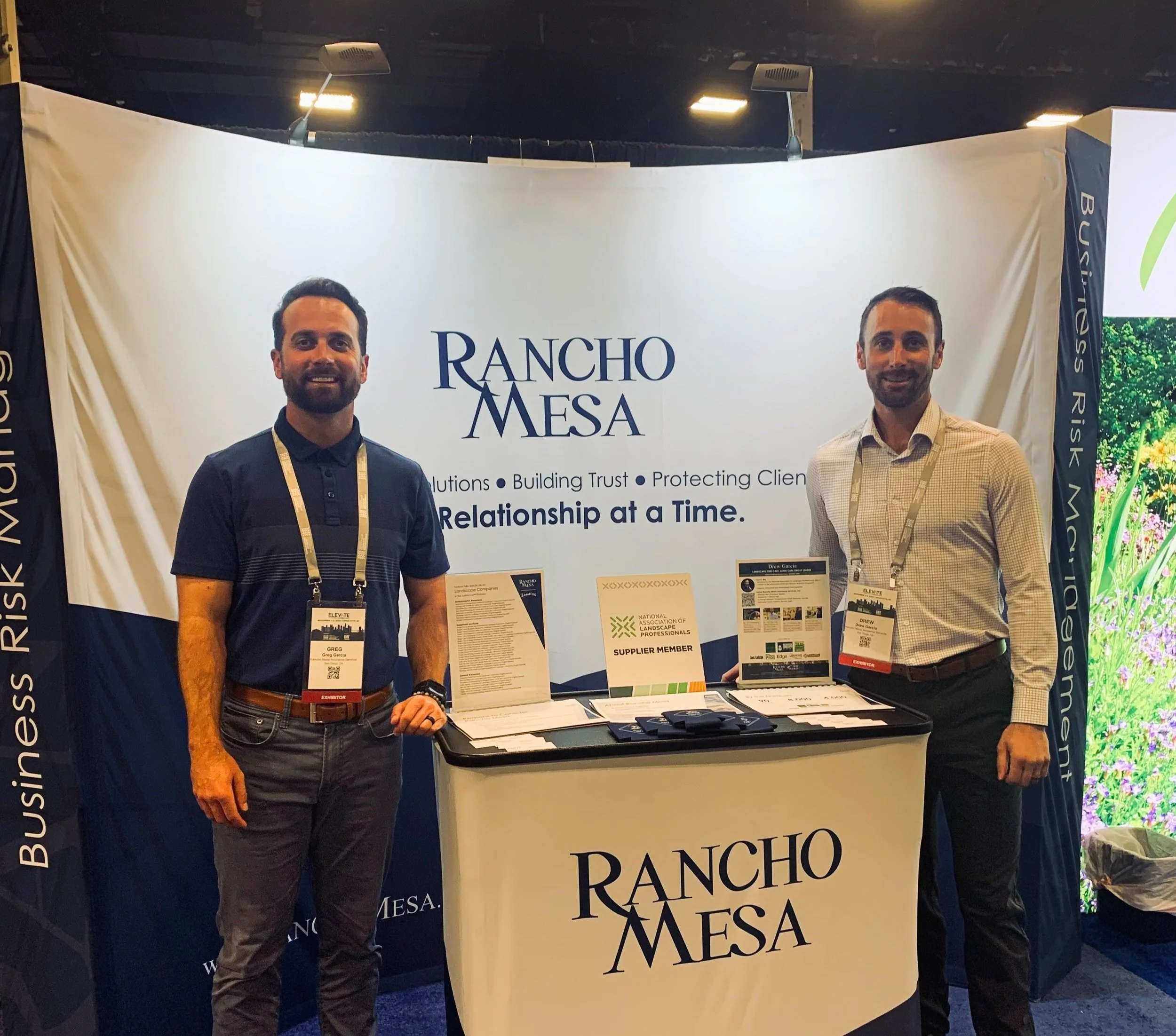  From Left: RMI Account Executive Greg Garcia and RMI Landscape Group VP Drew Garcia, stand at RMI Booth 