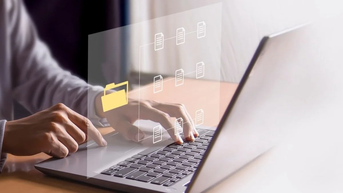 File icons hovering above laptop keyboard.jpg