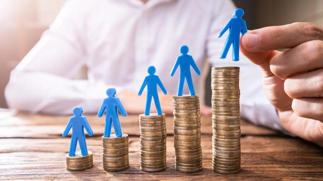 Wage Increase People on Coins.jpg