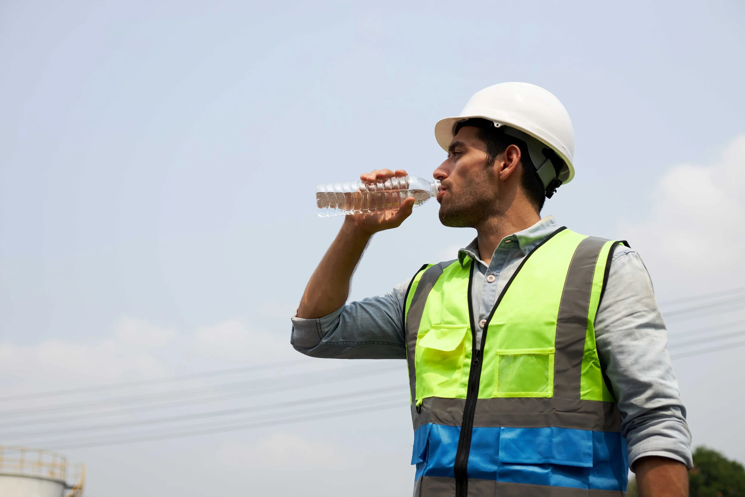 Construction worker drinking water 2.jpg