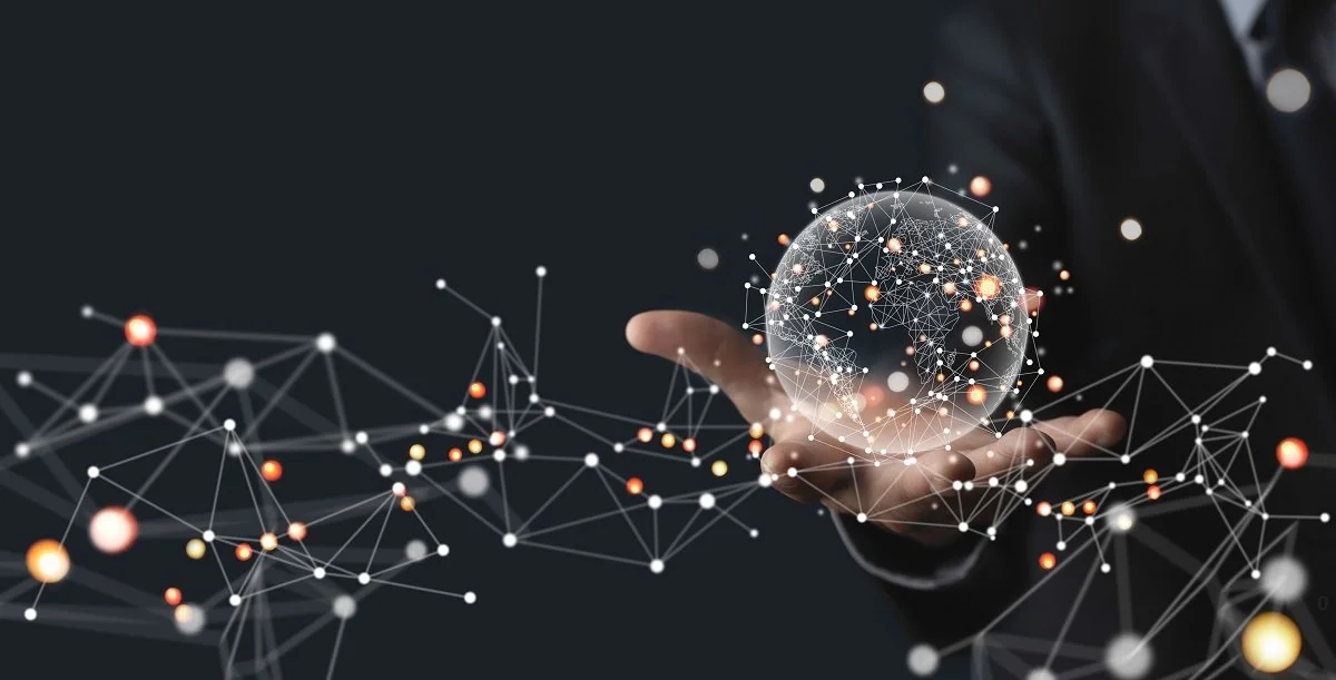 Businessman hand holding global network blockchain technology concept.jpg