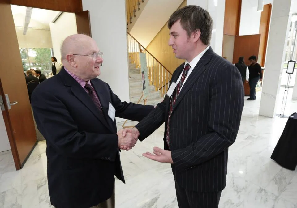 Attorney Jack Schulz pictured with nlrb attorney Joseph canfield at wayne state law school’s gottfried labor symposium