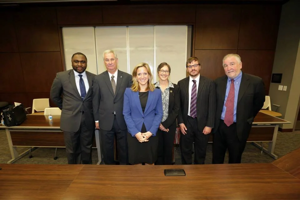 Attorney Jack Schulz pictured with fellow participants of a speaker panel on labor law at wayne state university law school