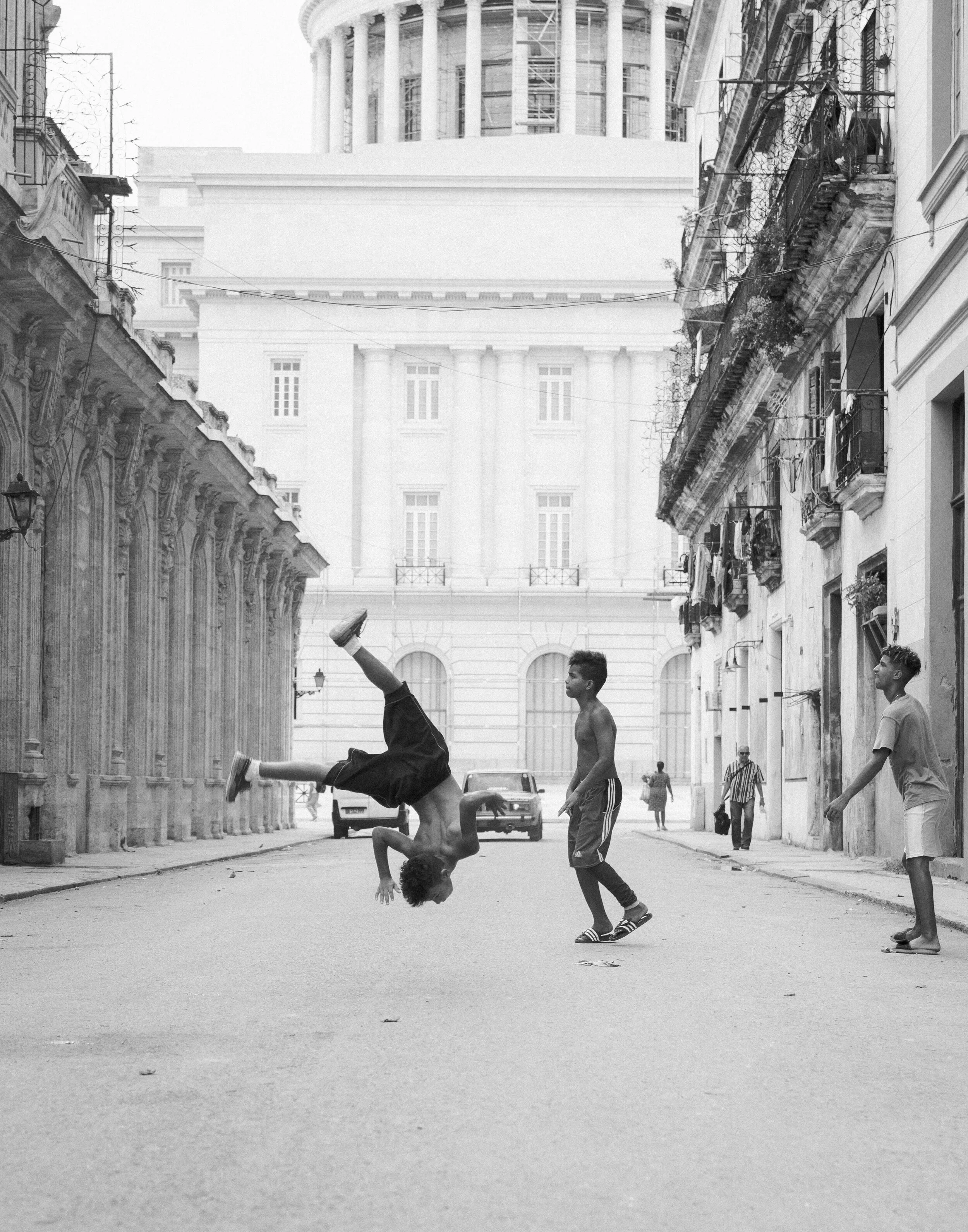 Kids playing by El Capitolio