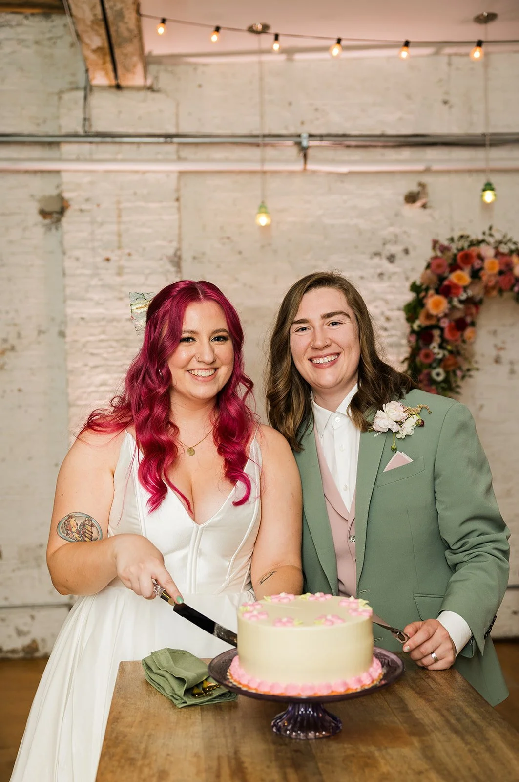 Queer wedding cake cutting 