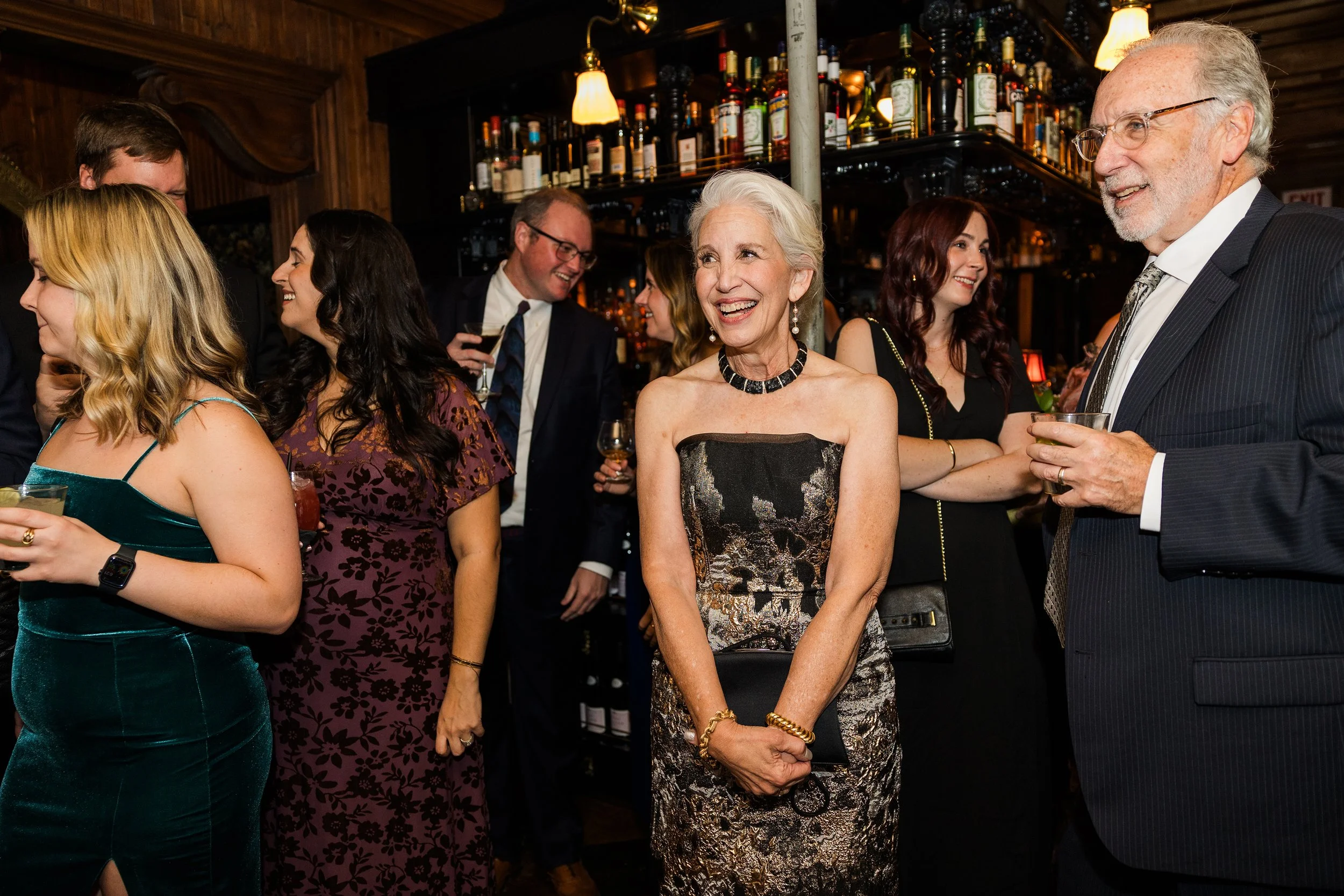Gilt bar wedding candid 