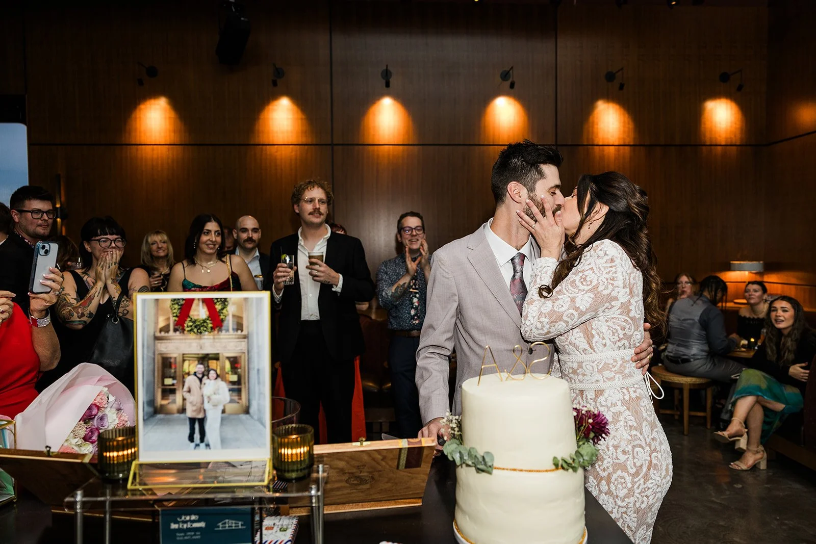 Candid cake cutting wedding photo at salt shed chicago 