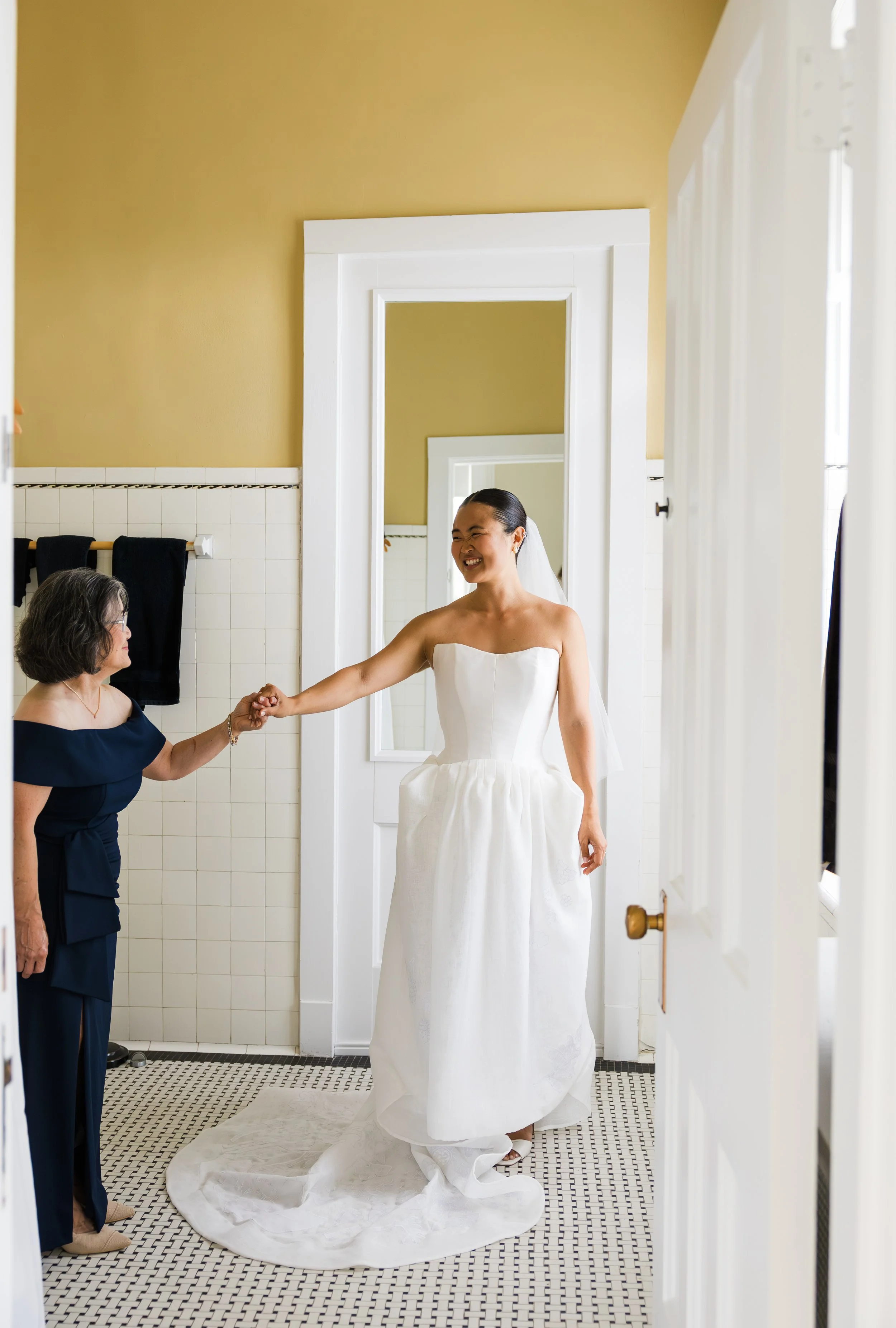 Candid photo of bride and mom