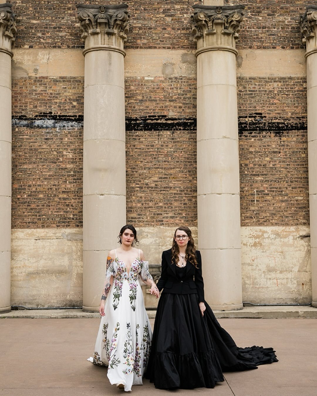 A couple days early, first anniversary post for H&amp;S who had possibly my favorite wedding dress combo of all time! Happy anniversary you two! 🖤🤍
&bull;
&bull;
&bull;
#queerweddingphotographer #lgbtqweddingphotographer #chicagoweddingphotographer