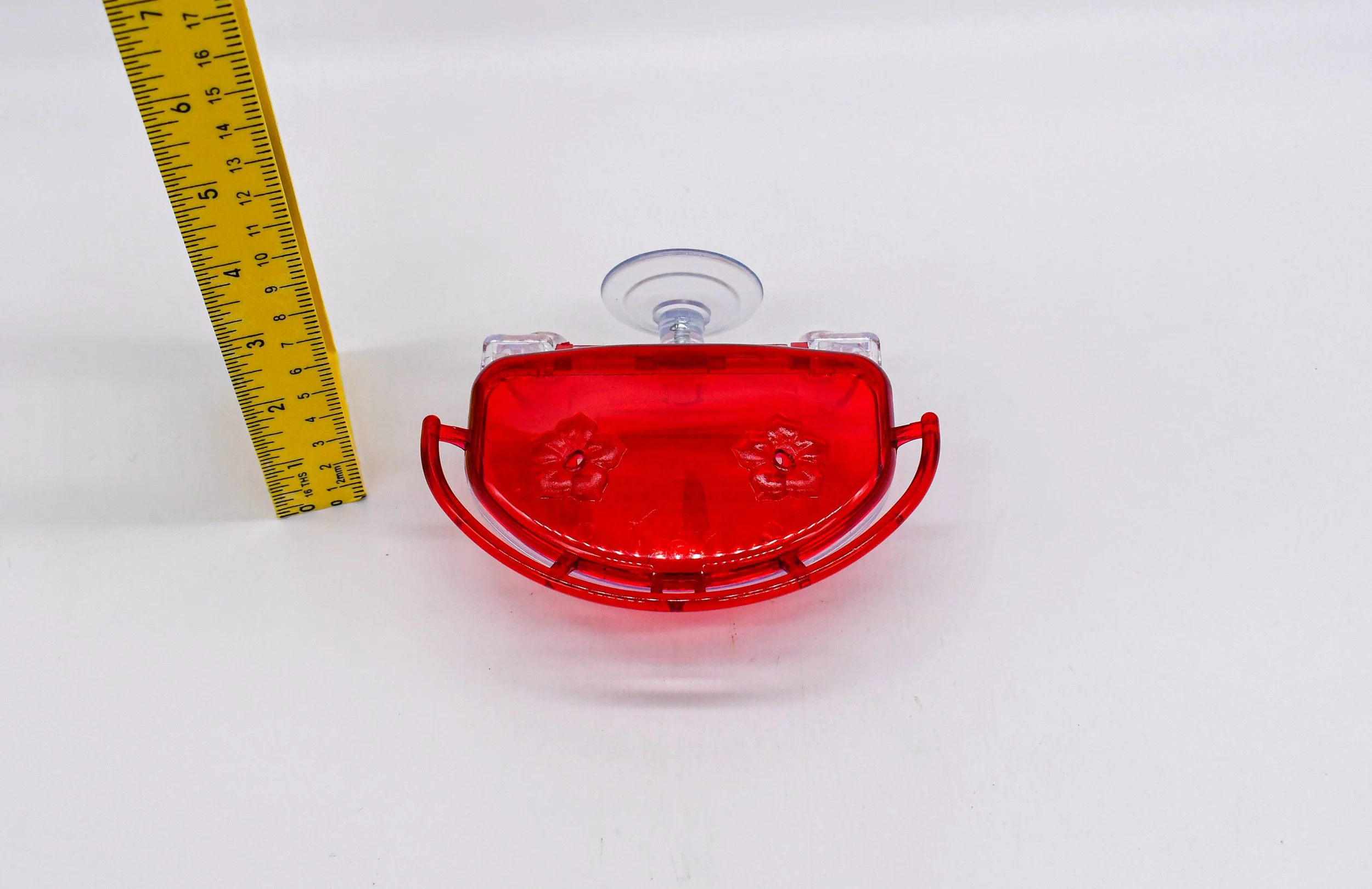 Rear view of the Aspects The Gem 4 oz Window Hummingbird Feeder displaying the window-mounted suction cup and overall height for size reference.