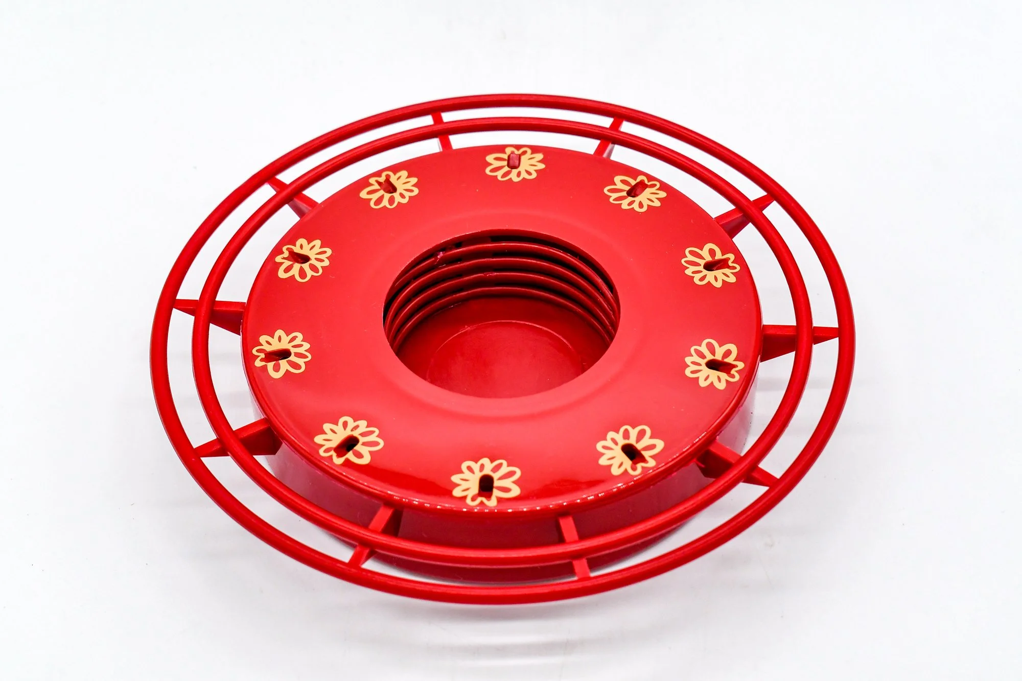 Top view of the red Turbine 10-station Mason jar base with flower-shaped feeding ports.