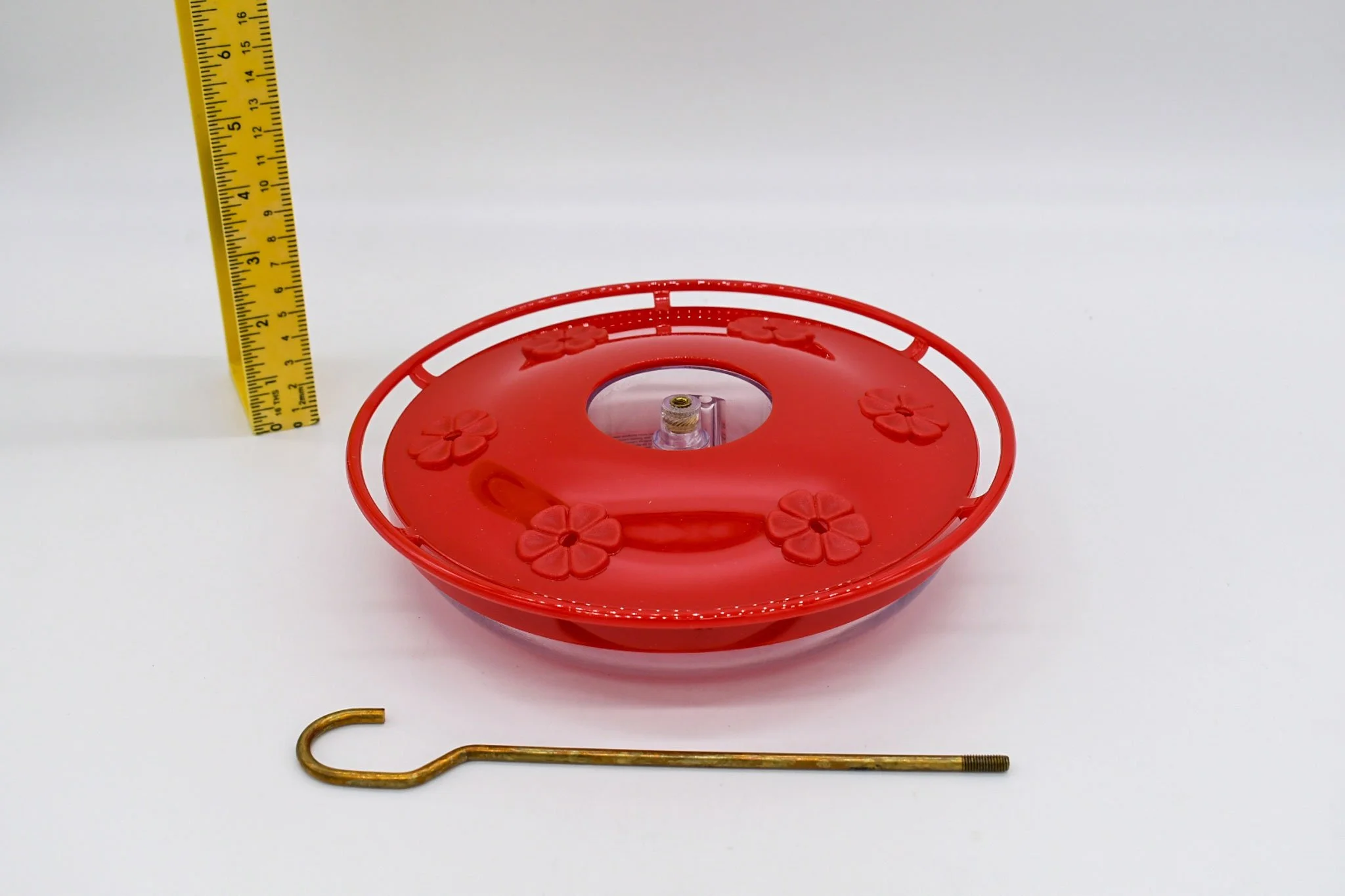 Low side view of the Aspects HighView Excel feeder with its removable hanging hook and measuring tape.