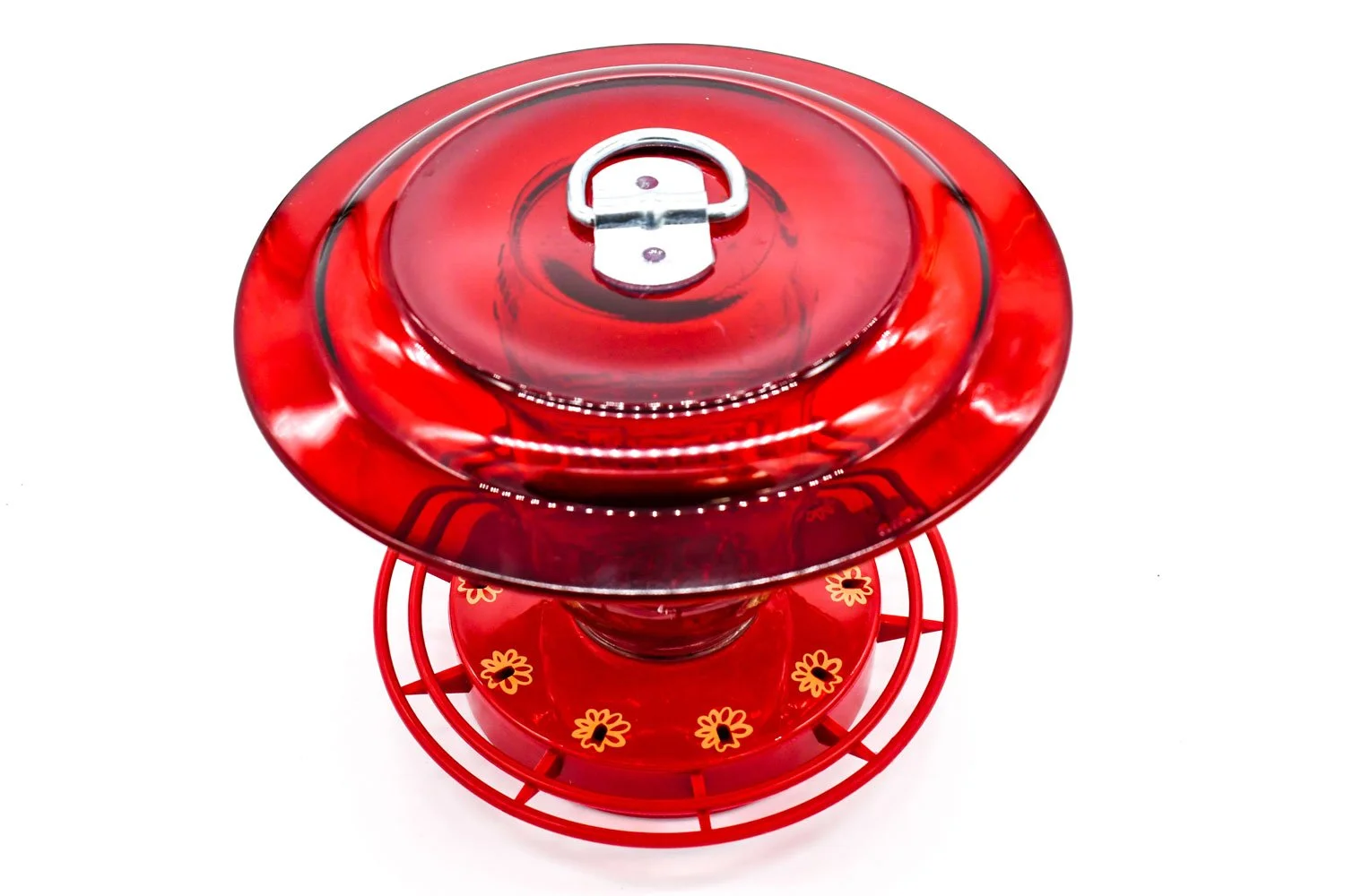 Mason jar hummingbird feeder with Turbine feeder base attached to red glass plate