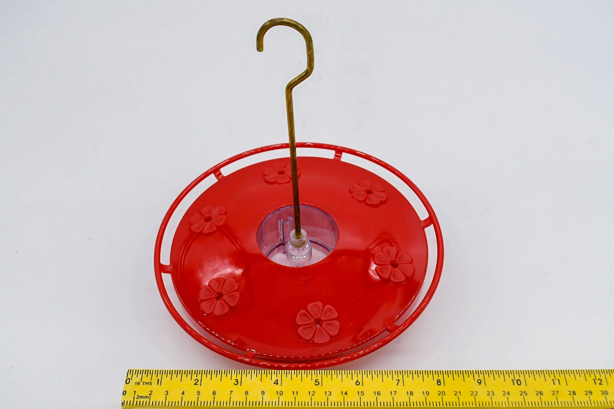 Front view of the Aspects HighView Excel hummingbird feeder with a horizontal measuring tape showing its overall width.