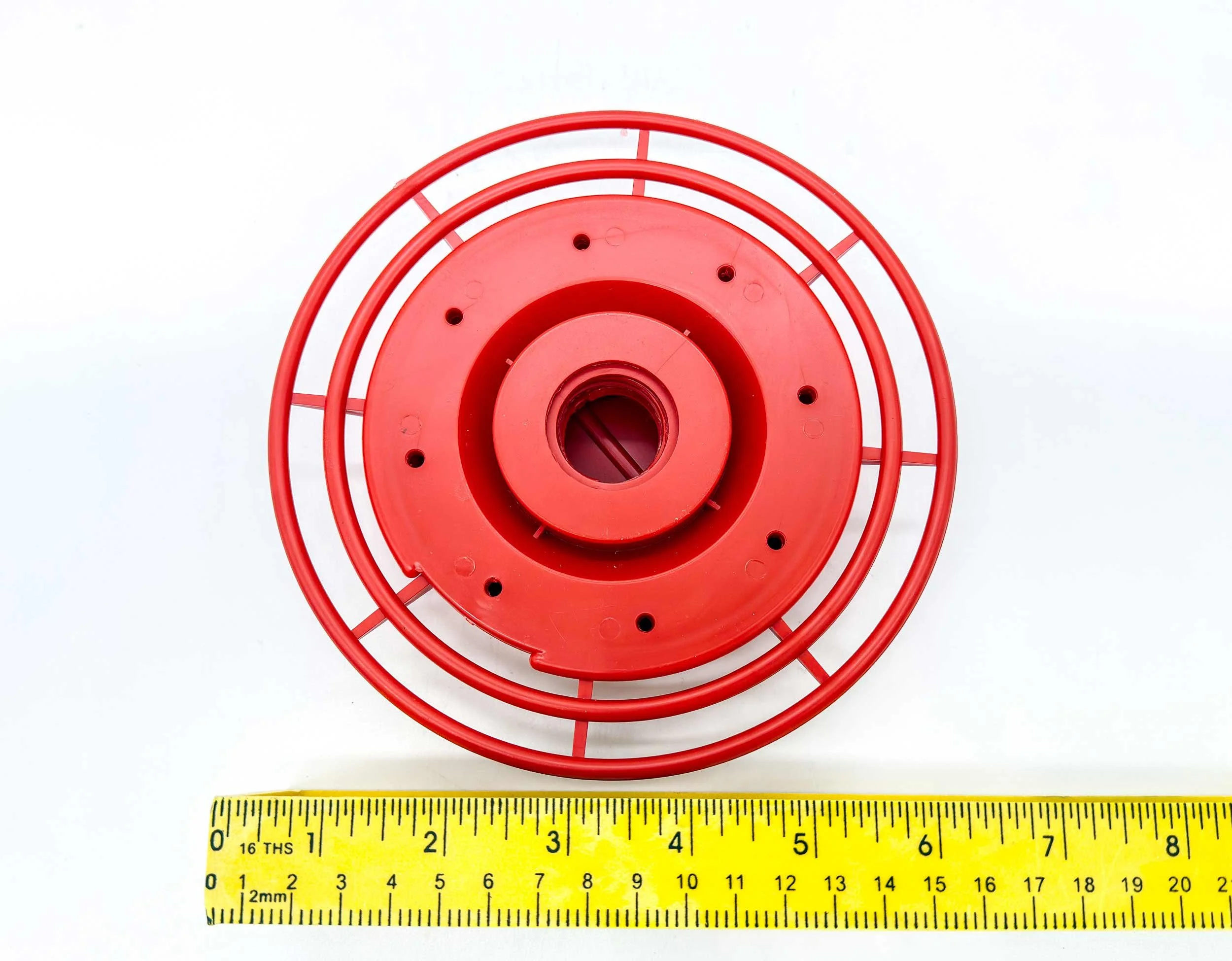 best1 feeder base with ruler to show size