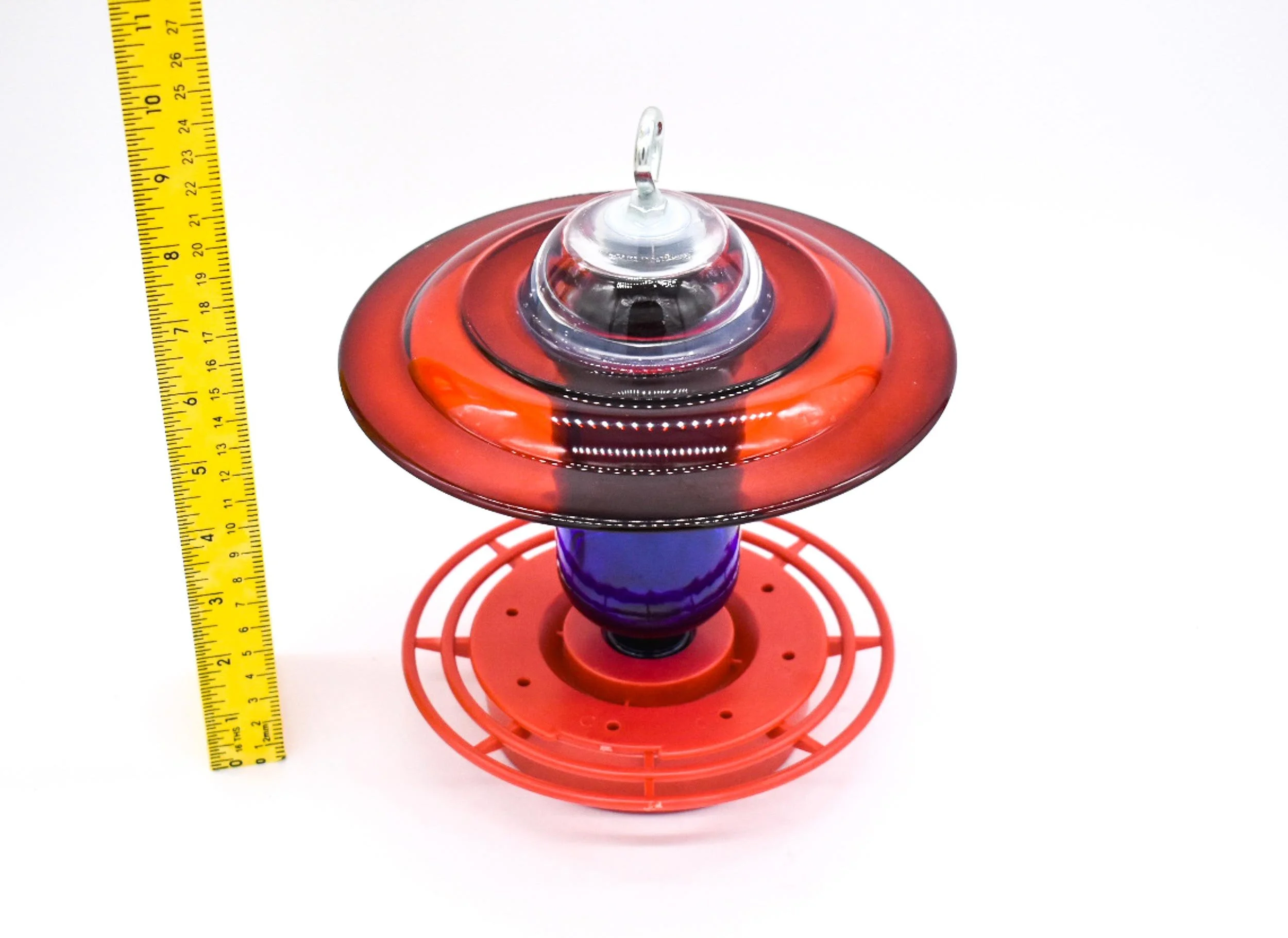 Top view of Red Anchor Hocking Hummingbird feeder with cobalt bottle.