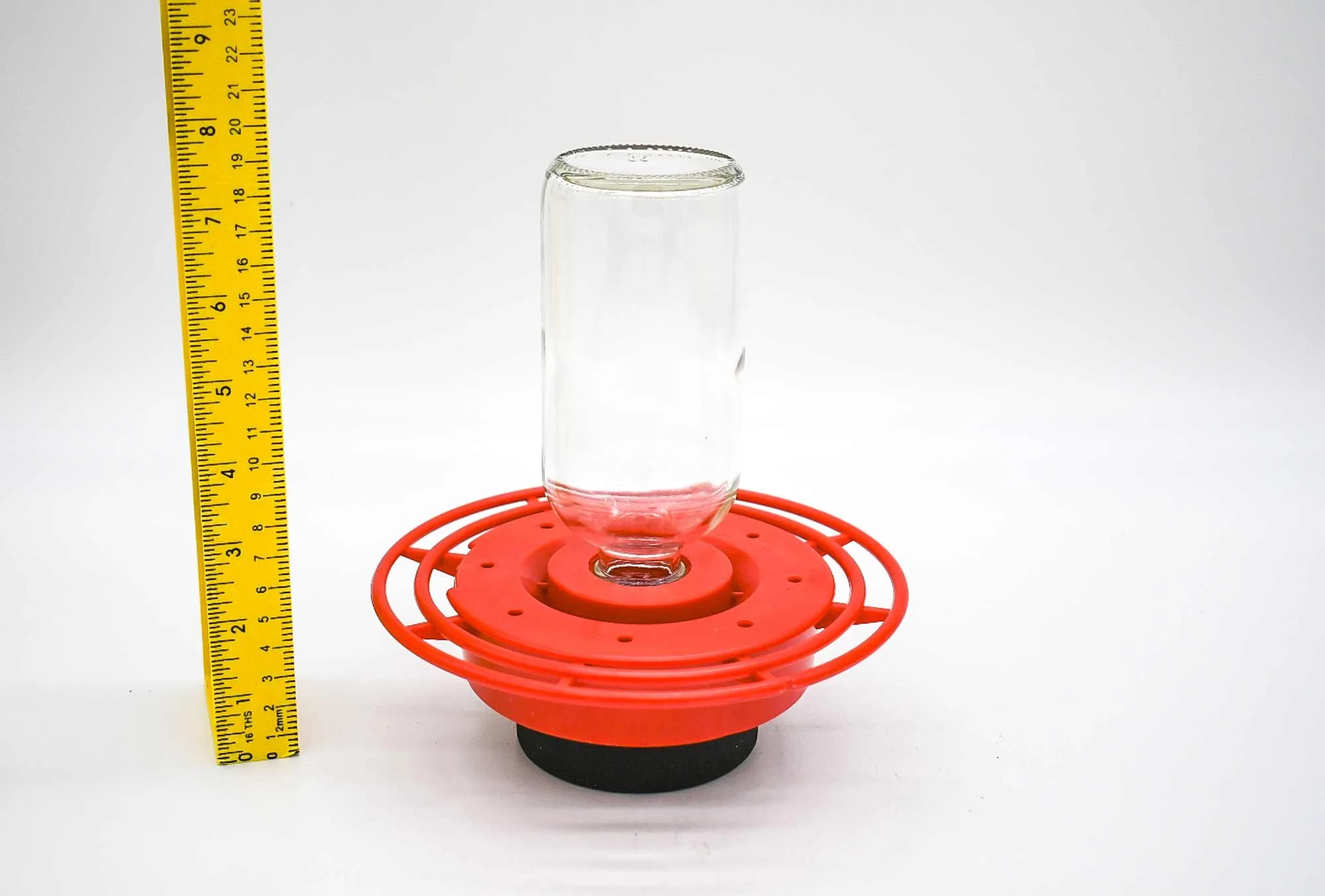 16 oz Clear Boston Round attached to Best1 Feeder Base with Puck.