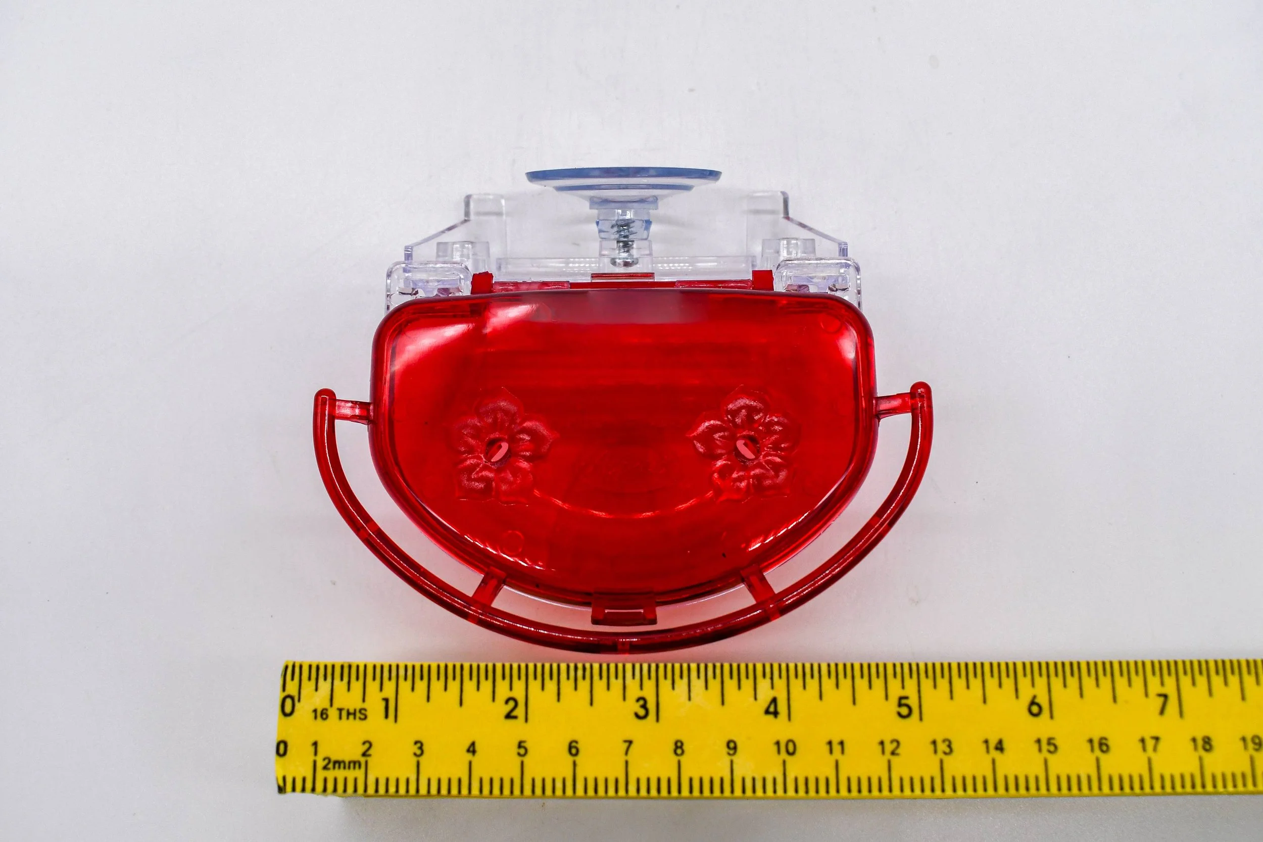 Top view of the Aspects The Gem 4 oz Window Hummingbird Feeder showing the dual flower feeding ports and integrated perch with width measurement for size reference.