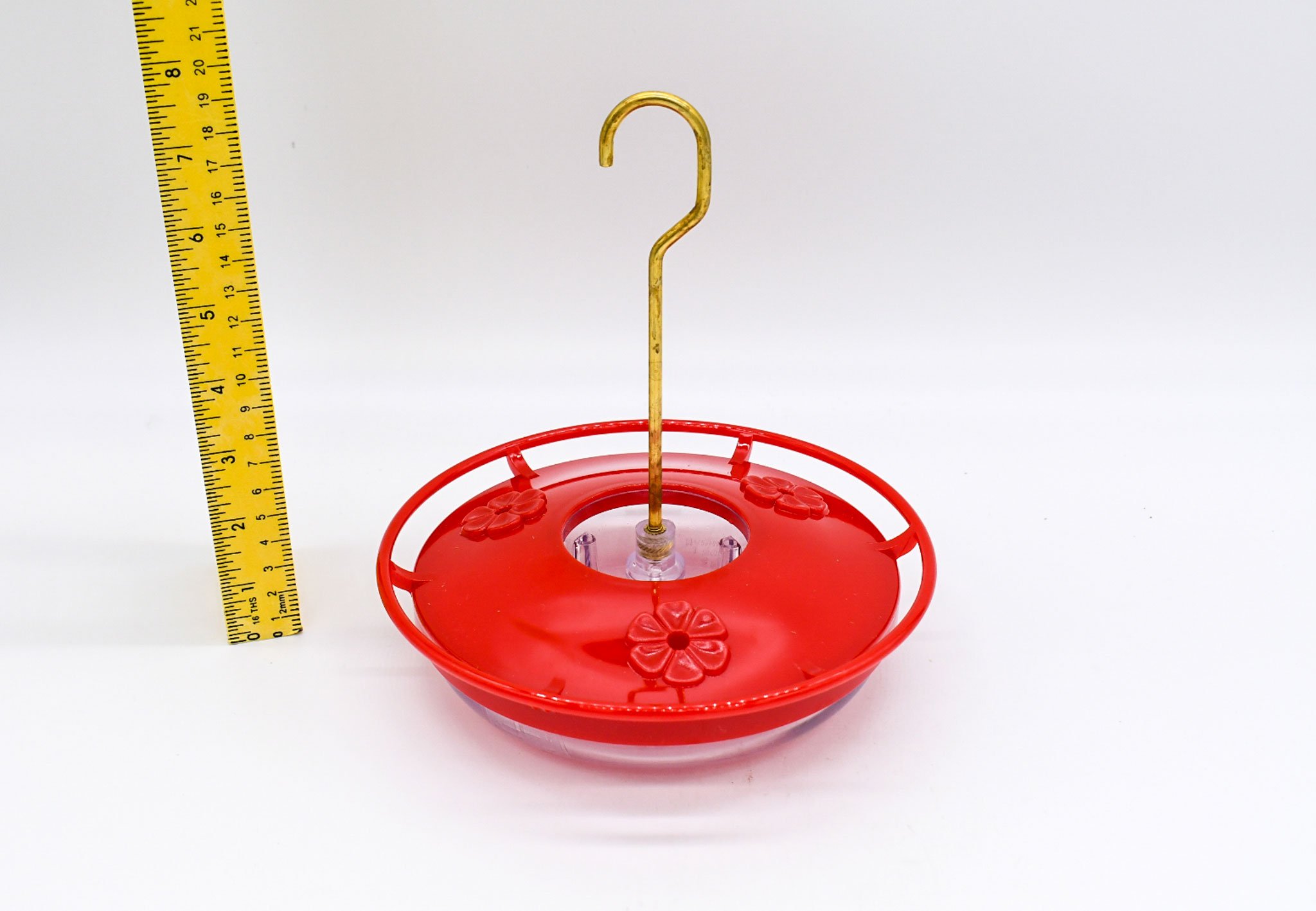 Angled front view of the Aspects HighView Mini feeder highlighting the circular perch and raised feeding ports.