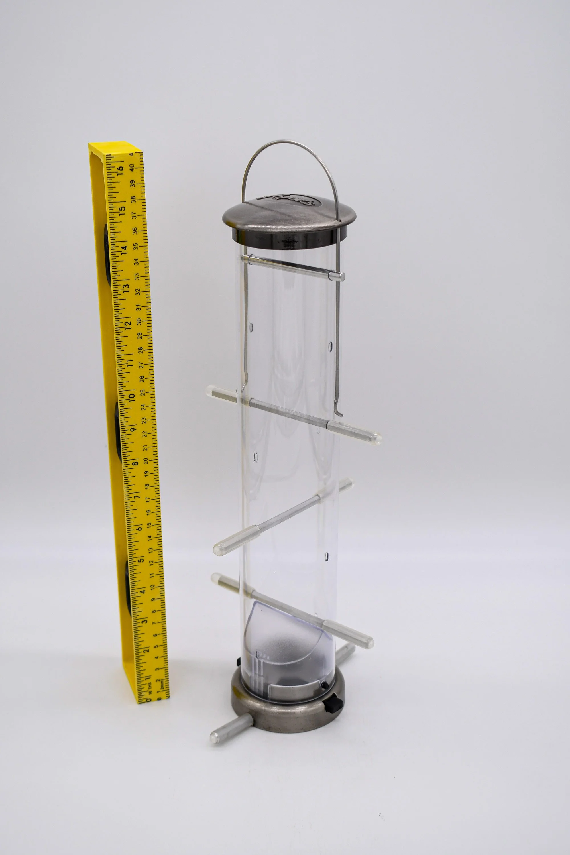 Aspects 400 Medium Nickel Finch Tube Feeder shown with ruler to demonstrate feeder height and overall size.