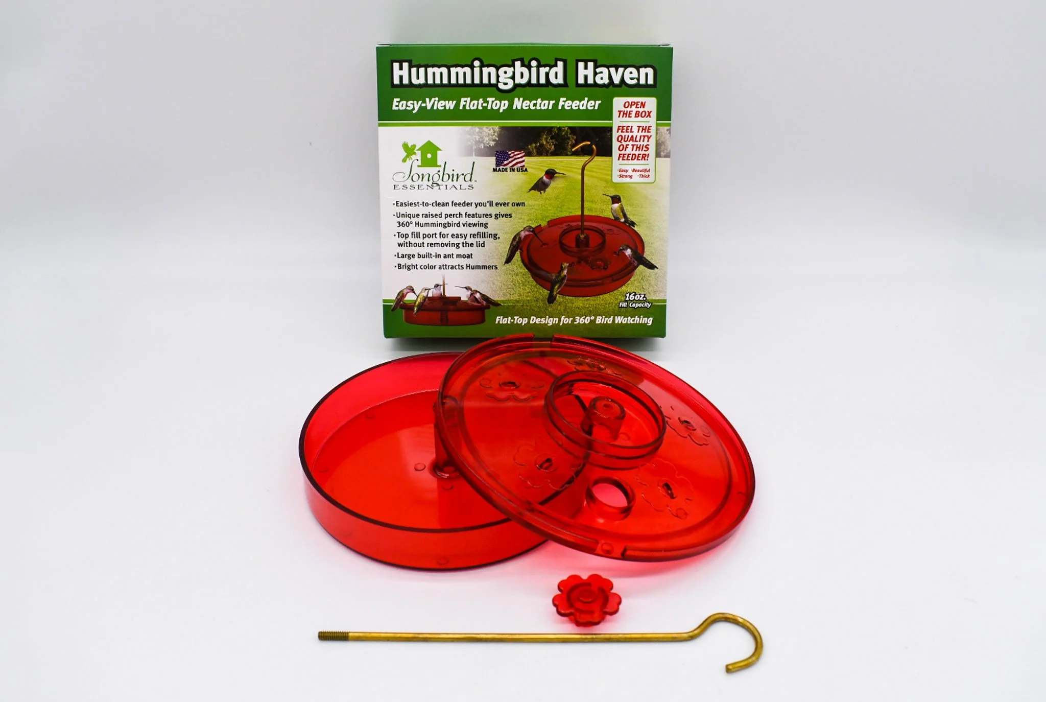 Hummingbird Haven feeder components, metal hanging hook, and retail packaging displayed together.