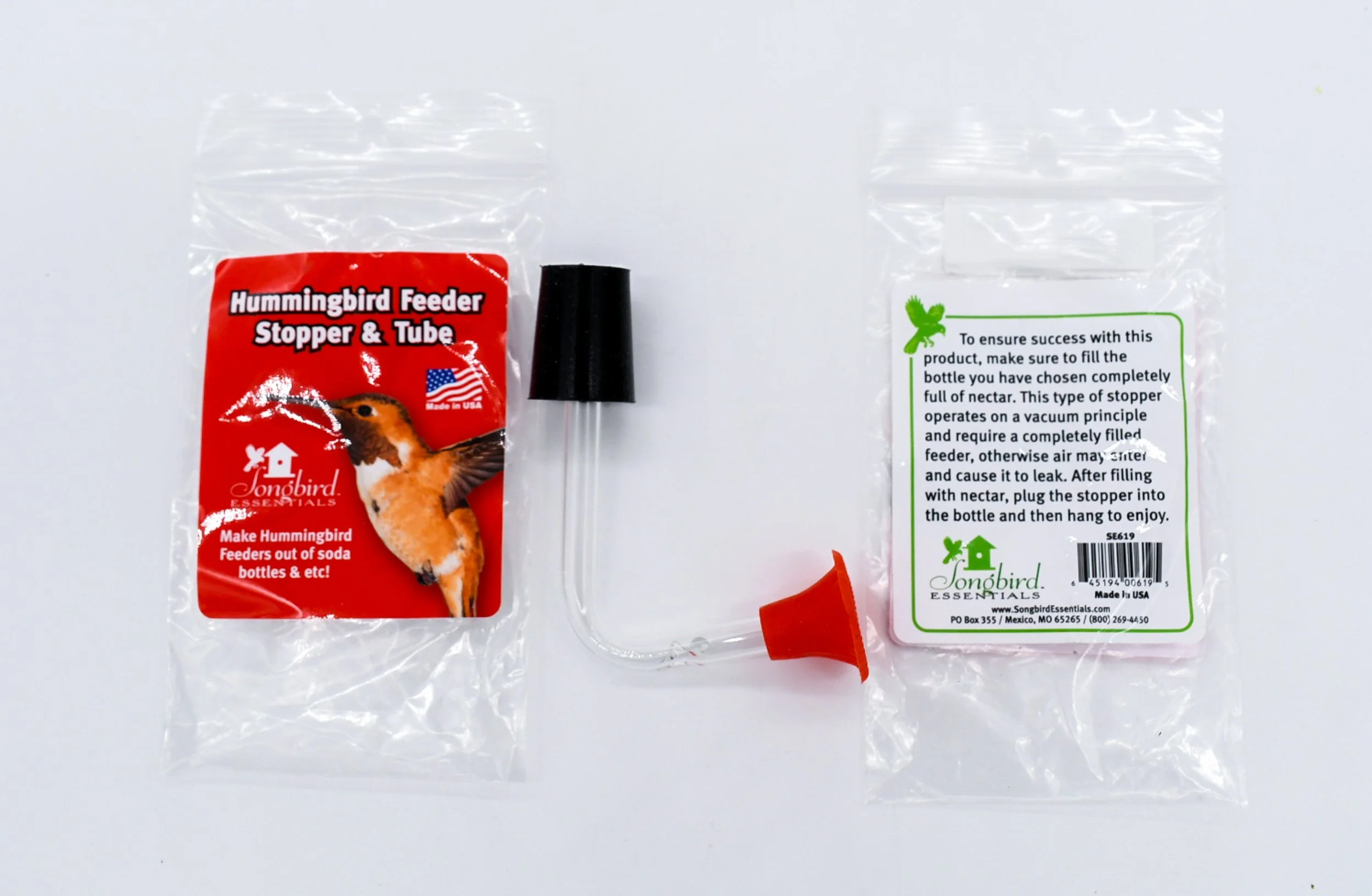 Songbird Essentials hummingbird feeder replacement stopper and tube with red flower feeding port and packaging
