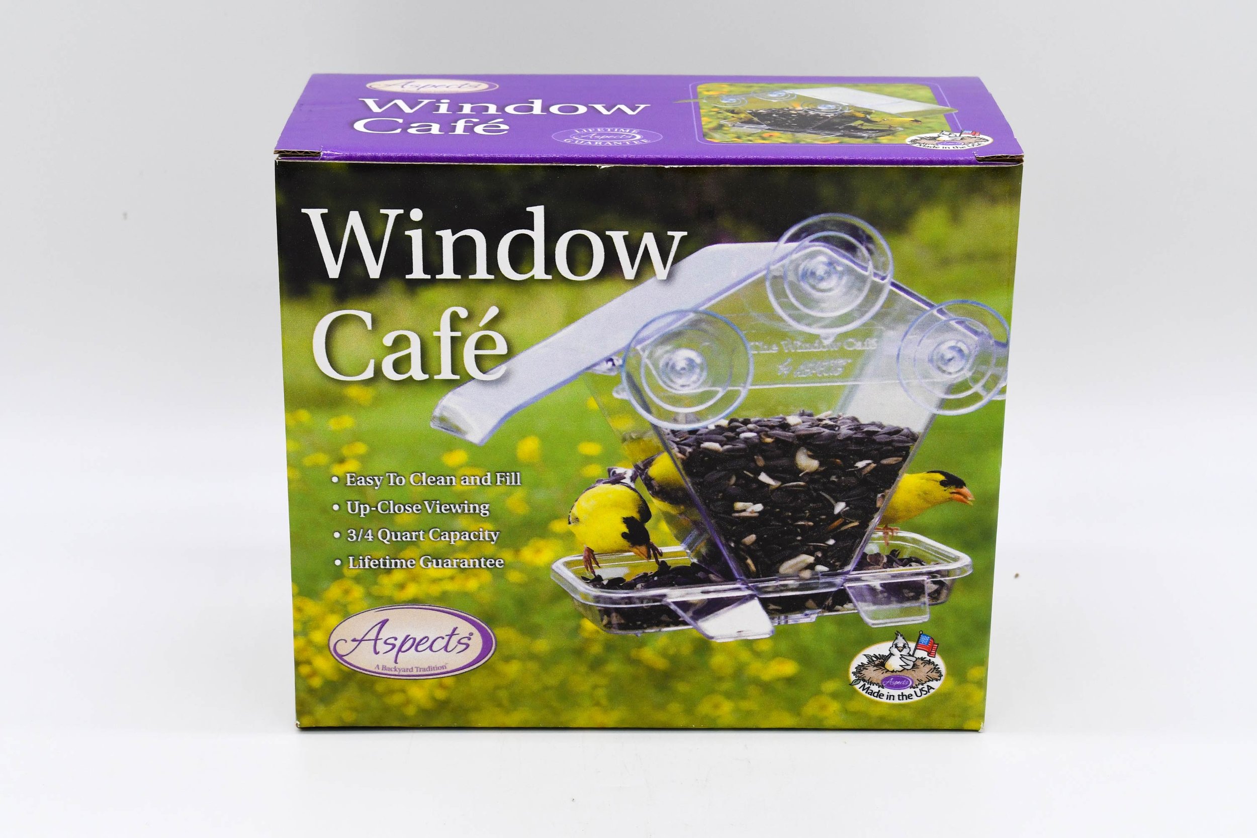 Front of the Aspects Window Cafe retail box showing the clear window-mounted seed feeder with yellow goldfinches.