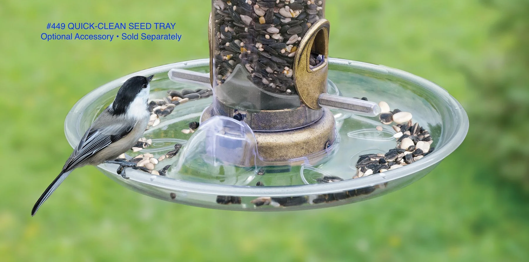 Aspects 449 Quick-Clean Seed Tray optional accessory installed on a tube feeder with finch feeding at the tray, sold separately.