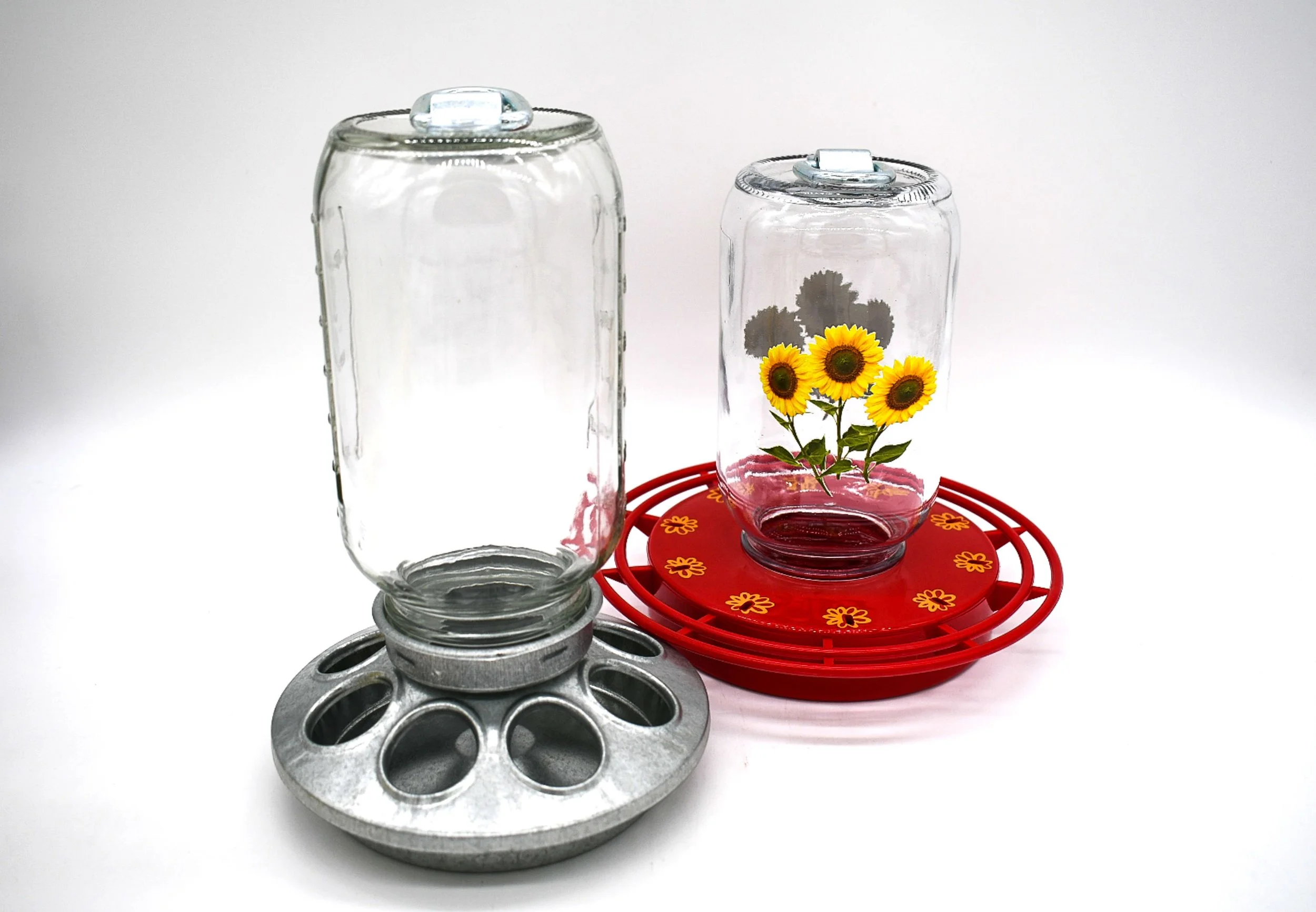 32 oz Mason jars shown with standard chicken feeder and Turbine hummingbird feeder bases
