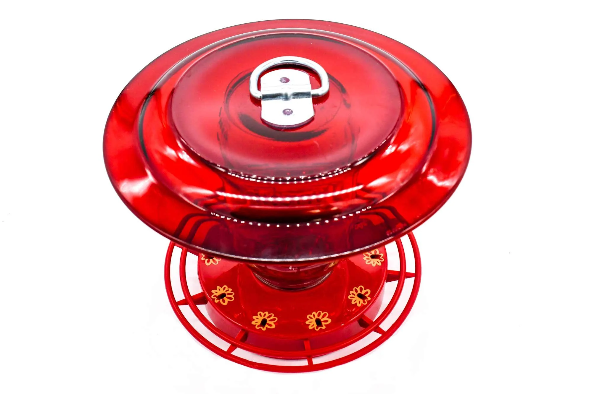 photo showing turbine feeder mounted to mason jar with anchor hocking red plate.