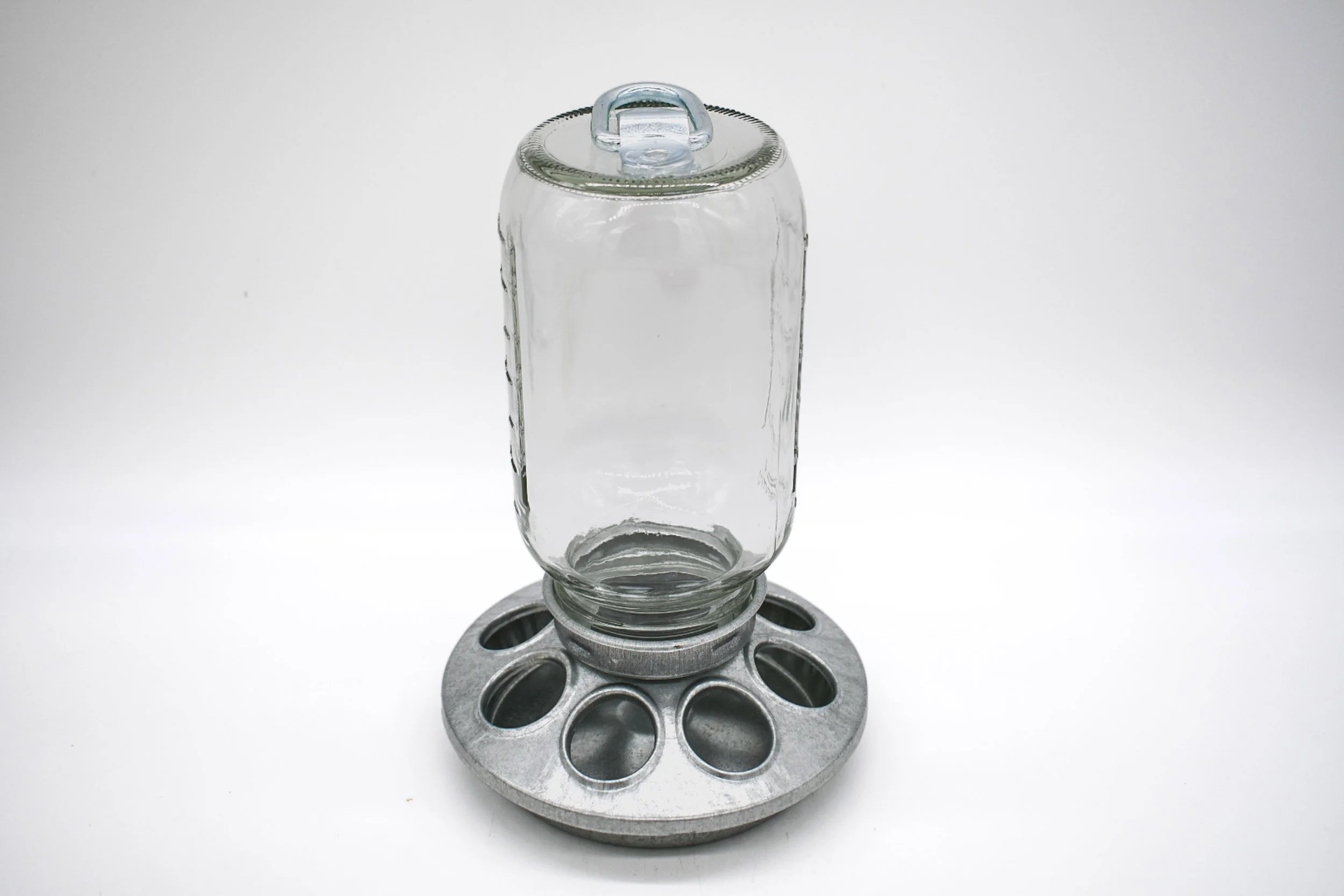 32 oz replacement Mason jar installed on standard metal chicken feeder base