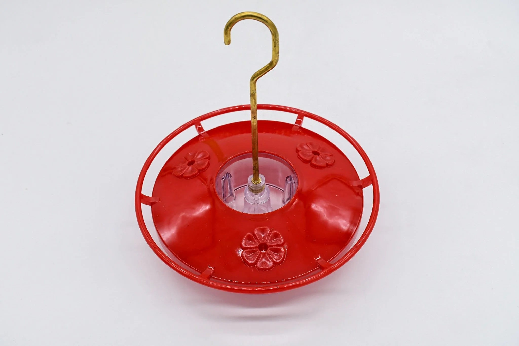 Front view of the Aspects HighView Mini hummingbird feeder with brass hanging rod installed.