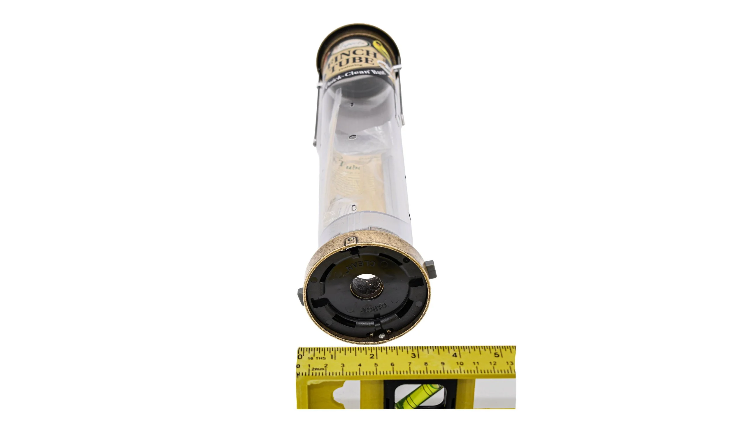 Bottom view of Aspects 402 Quick Clean Nyjer feeder showing the removable base and measuring tape for size reference.