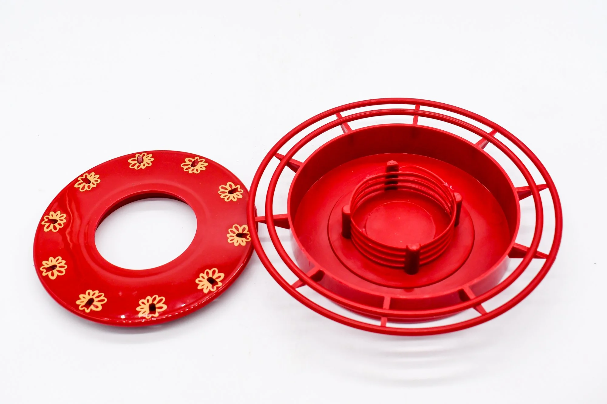 Elegant ruby red hummingbird feeder, featuring a 9” Anchor Hocking plate top and easy-clean 10-port bee-proof base.