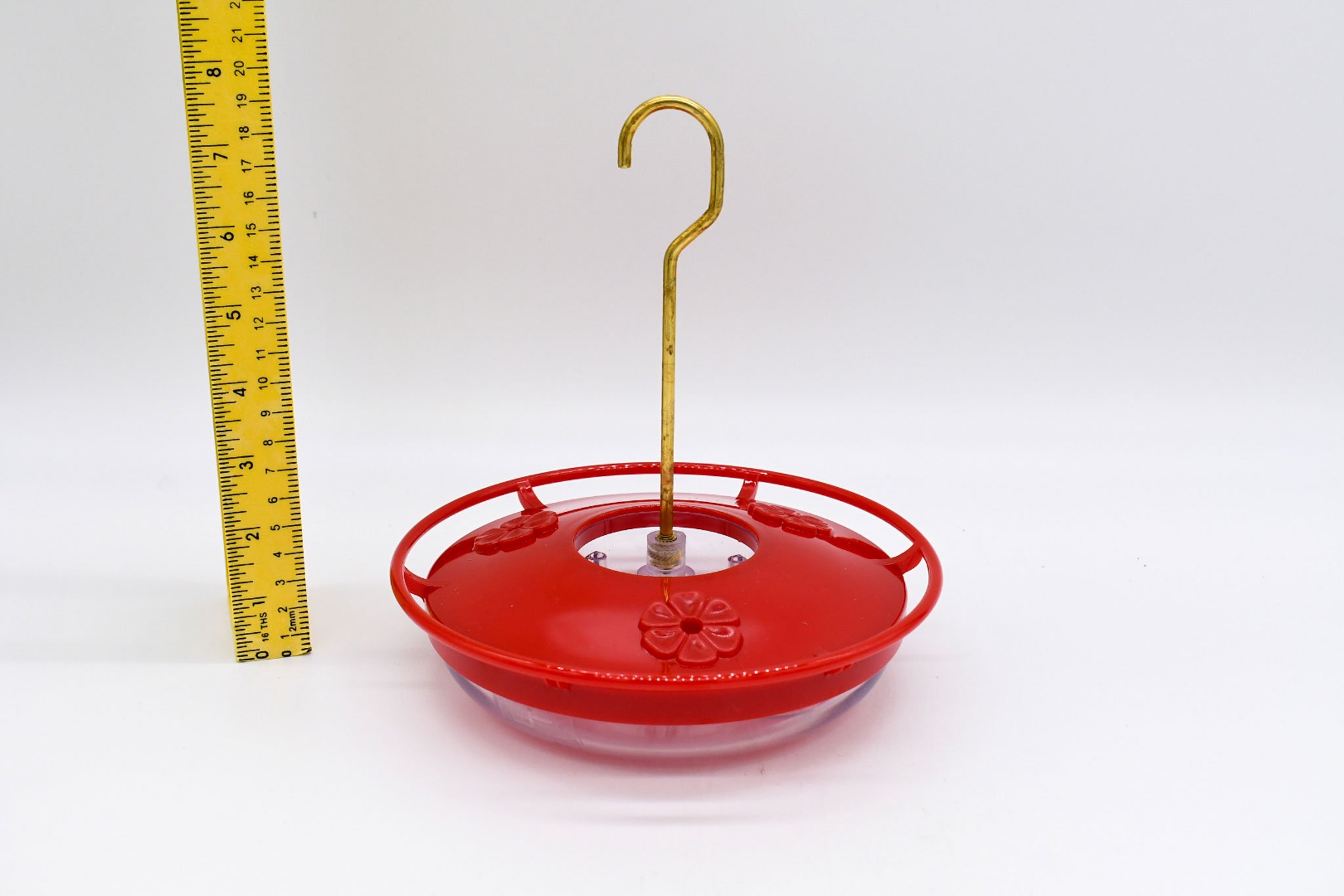 Side profile of the Aspects HighView Mini 8 oz hummingbird feeder showing compact design and hanging hook.