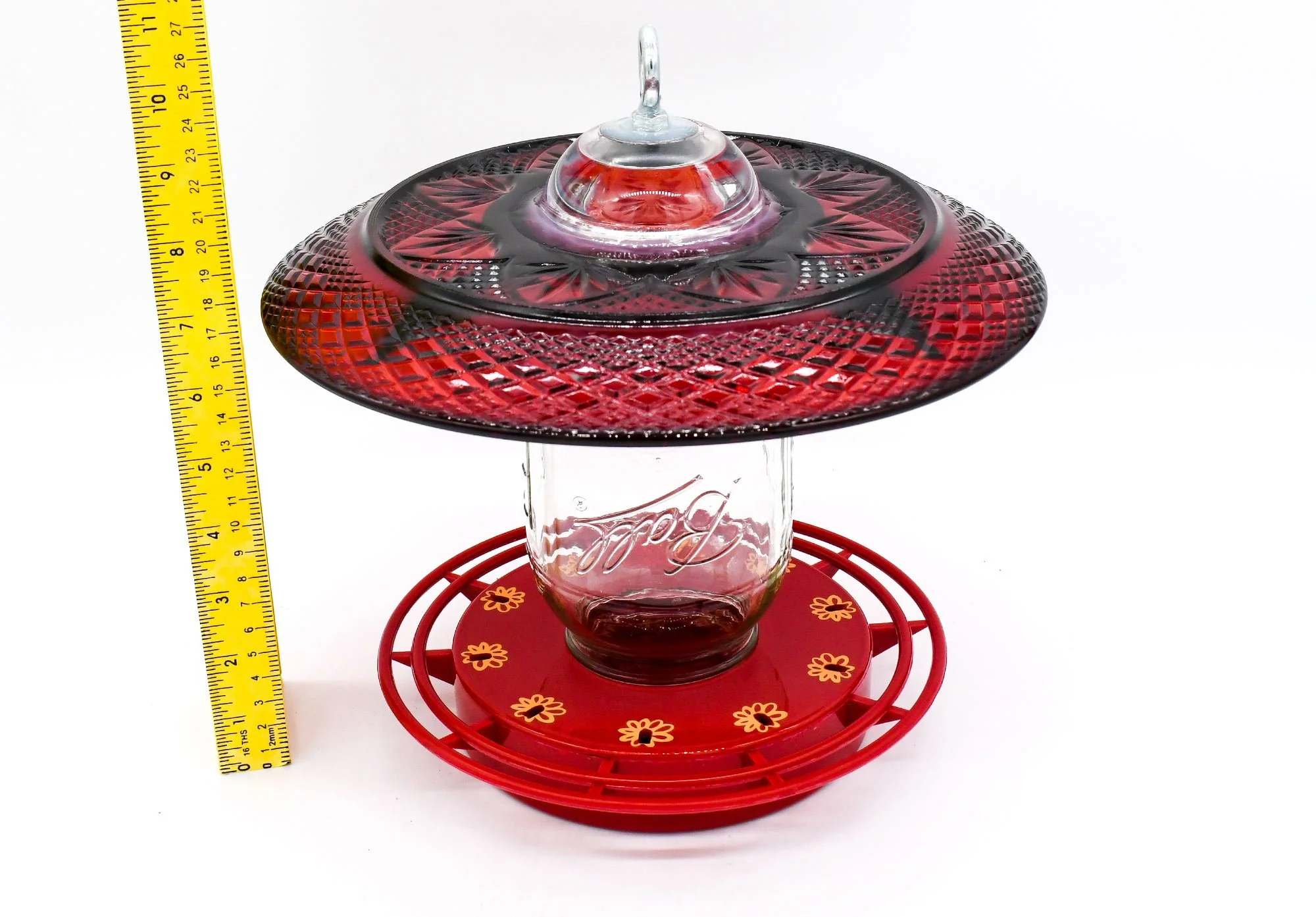 Red Glass plate with engraved designs in plate