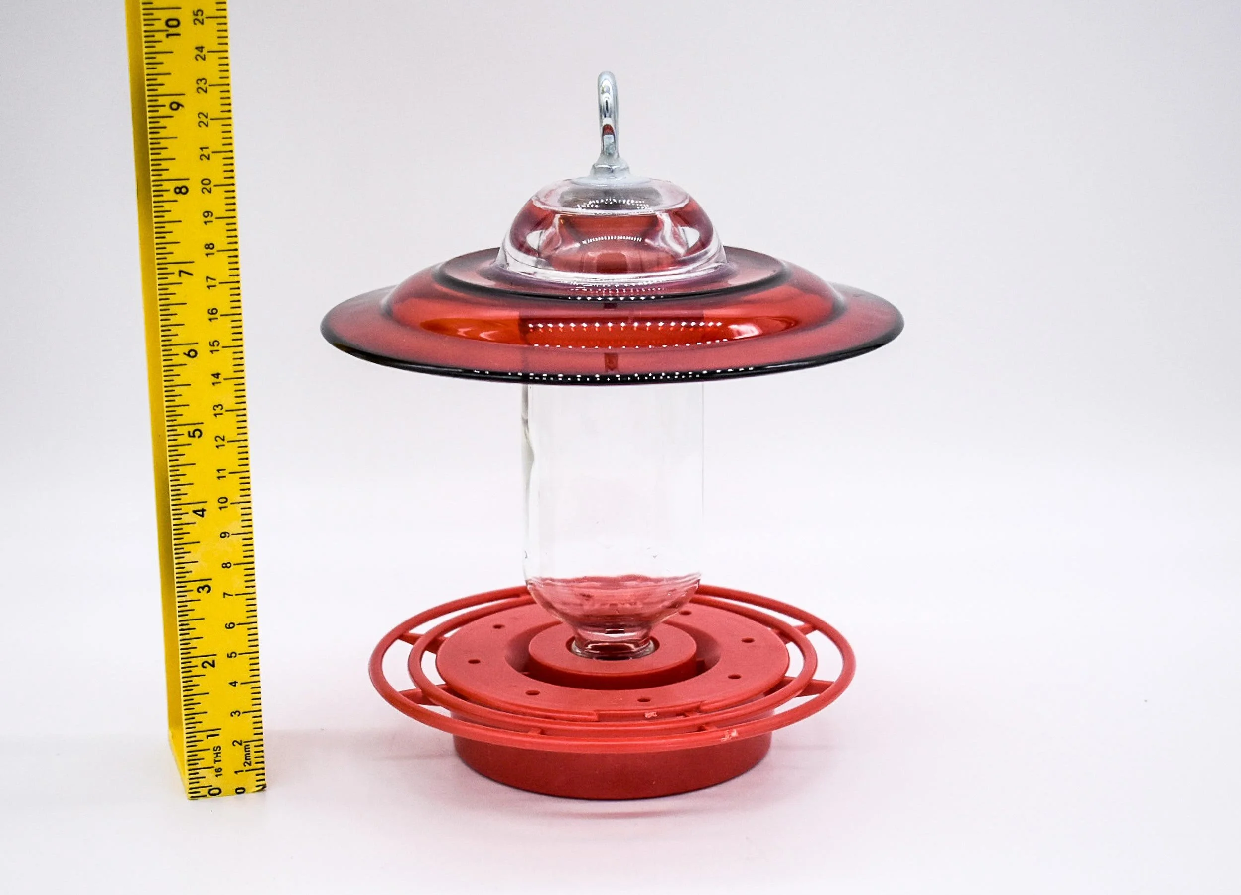 Side view of red Anchor Hocking Clear Bottle Hummingbird Feeder