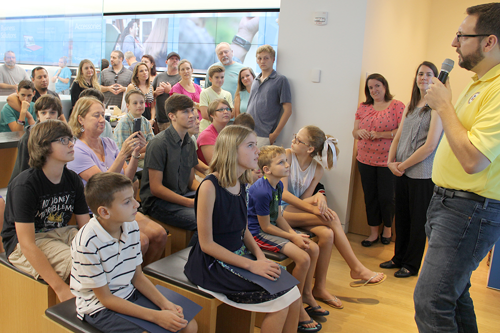  Lone Star Groundwater Conservation District’s Education / Public Awareness Coordinator, James Ridgway, Jr., far right, addresses the audience during the Minecraft Water Challenge Winner Announcement on August 28, 2016, at the Microsoft Store in The 
