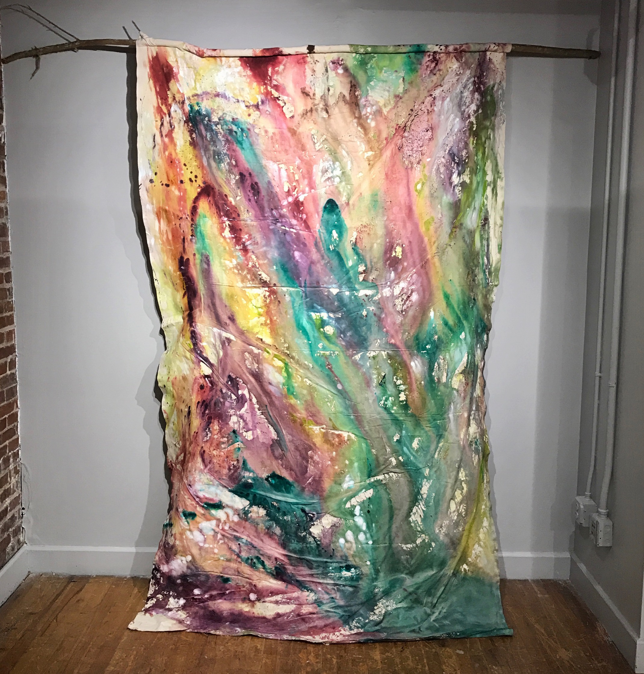   Still Thriving , branch, braid, canvas, acrylic paint, 10’x2’x5', 2016 
