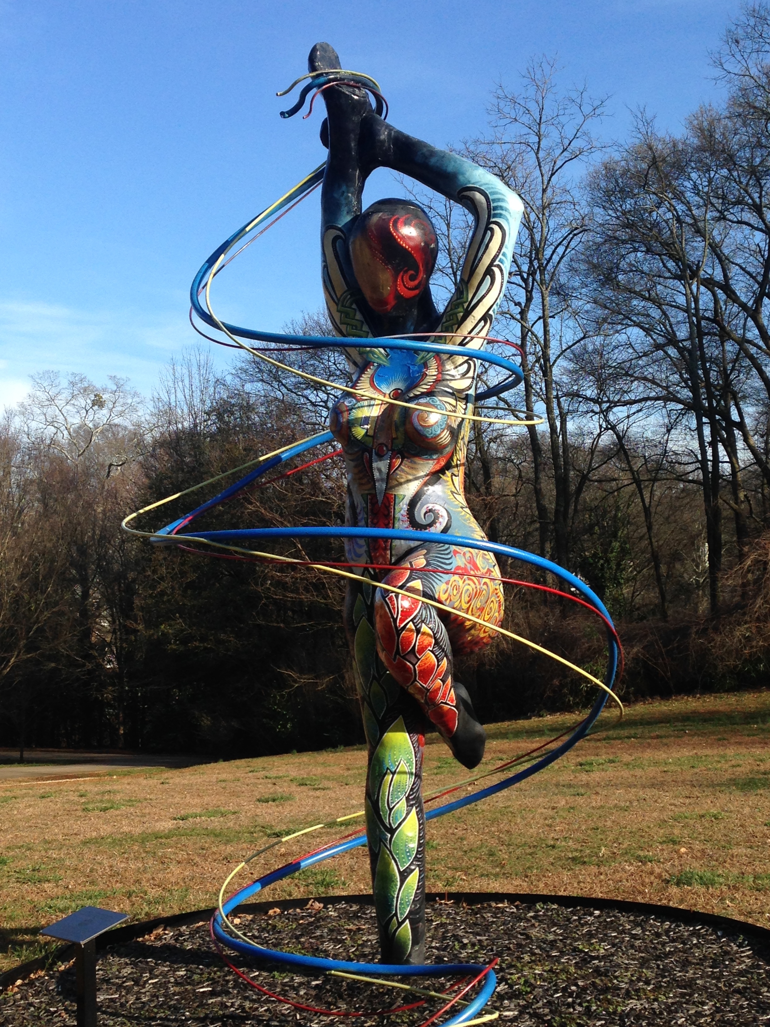 "One Woman Rising" sculpture by Phil Proctor, Scott Fray, and Madelyn Greco, in Freedom Park
