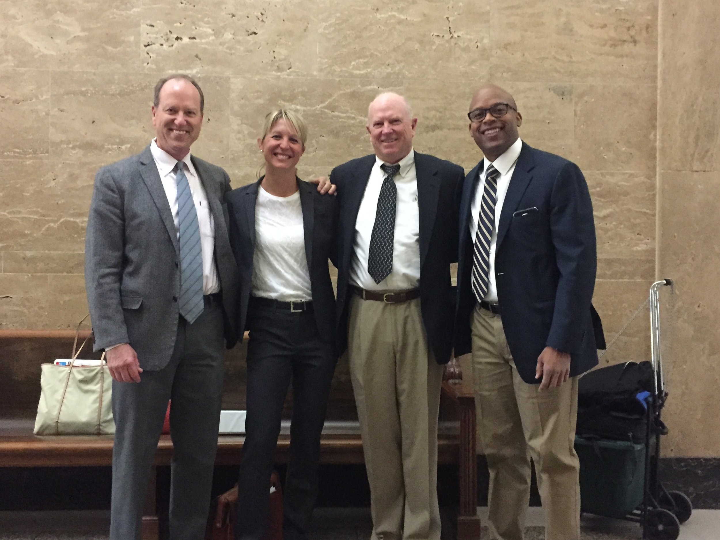 From L: Co-Counsel Rich Kaudy, Megan Hottman, D.K., and co-counsel Cajardo Lindsey. #TeamWorkMakesTheDreamWork