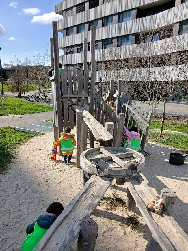 english and french speaking students on playground in Meyrin