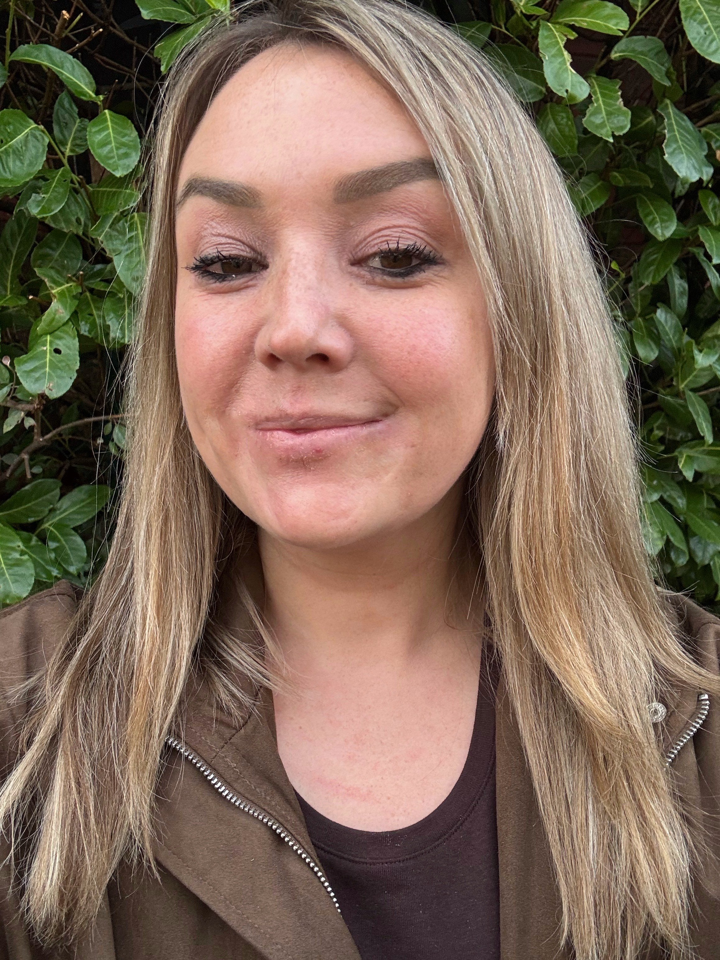 Smiling experienced preschool teacher in Geneva