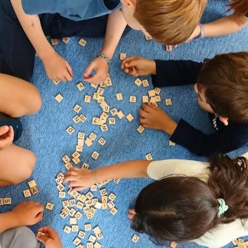 Children at the Swedish School doing academics.