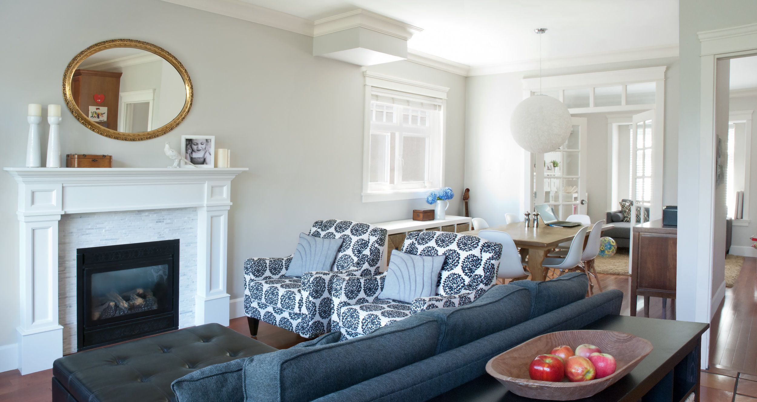 For this young family the time had come to ditch the builder's basics and family hand-me-downs and invest in a style that is all their own. We repainted every room in the house as well as the two fireplace surrounds on the ground floor, adding a mod